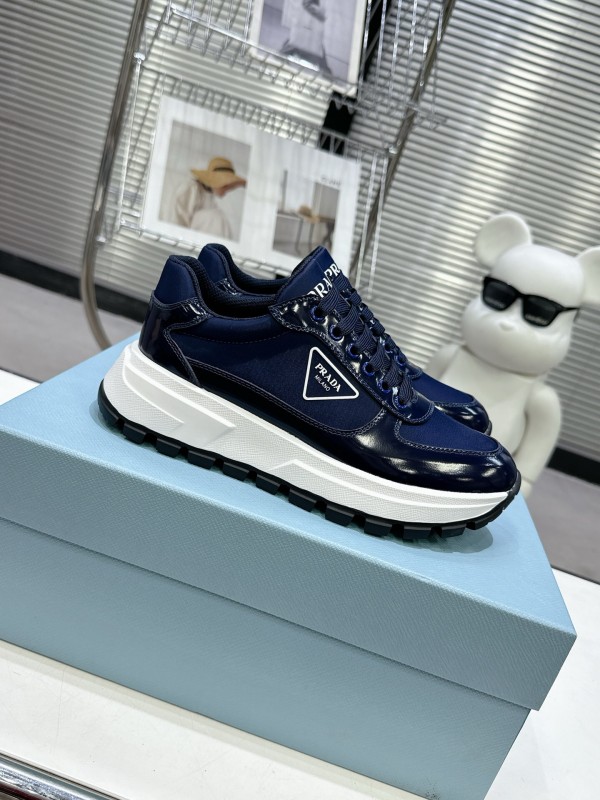 2025 Women Prada Blue Leather Sneakers KFY00310