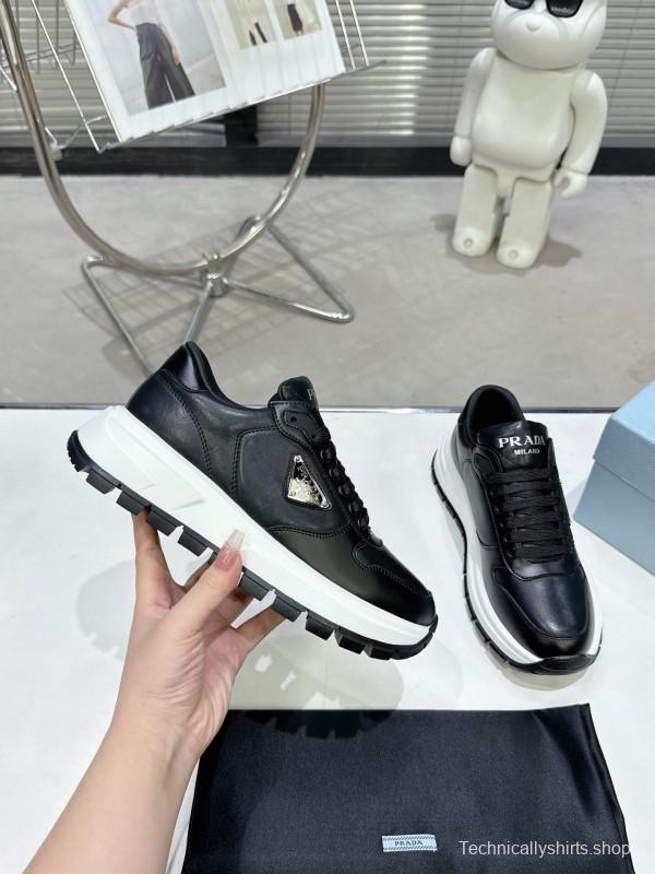 2025 Unisex Prada Black Leather Sneakers KFY00310