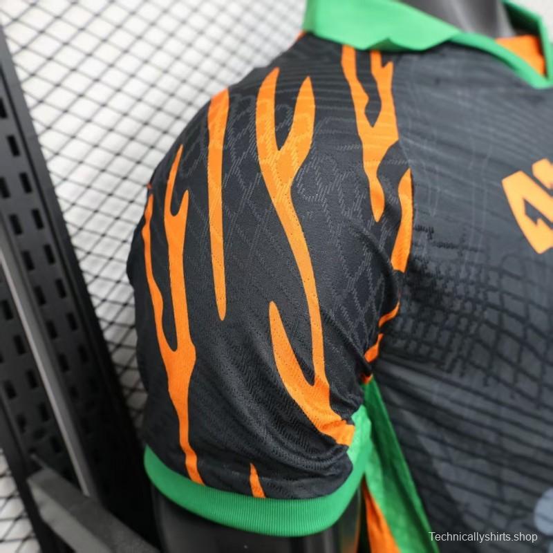 Player Version 2025 Ivory Coast Black with Elephant Graphic and Orange Stripes Jersey
